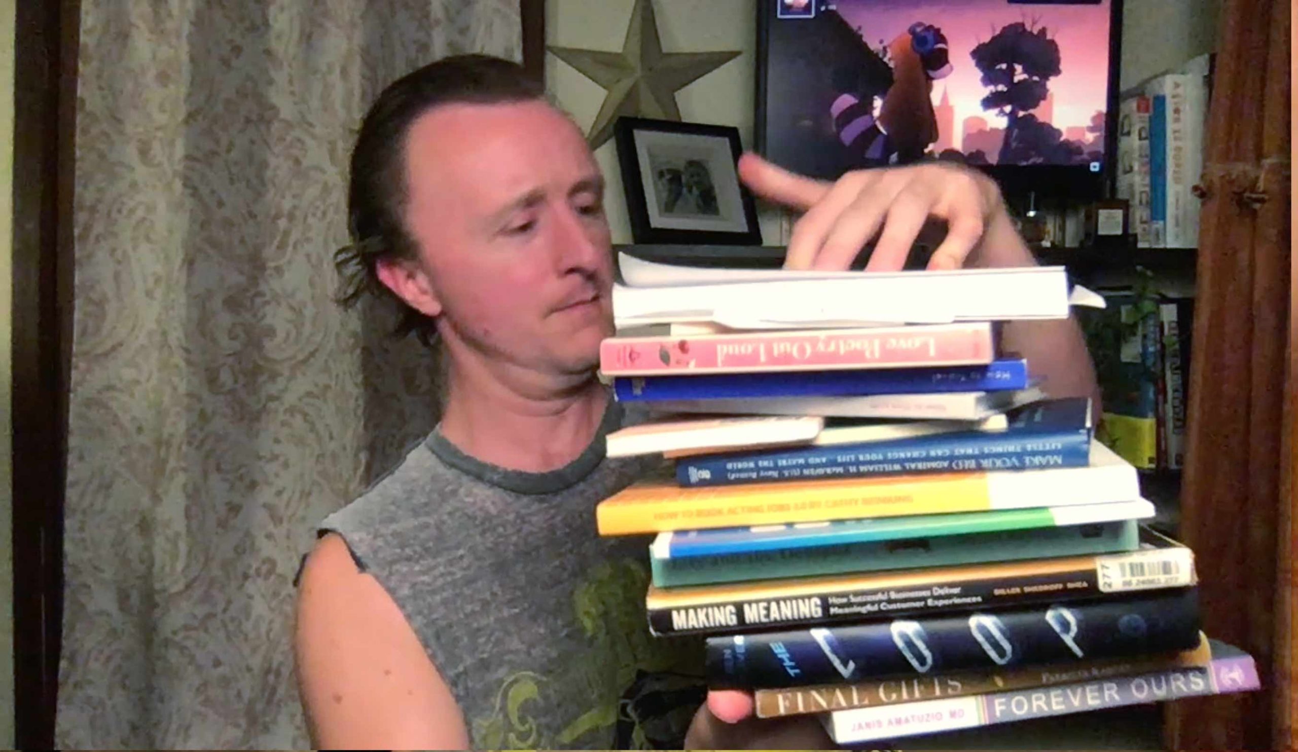 Paul Cram with book stack