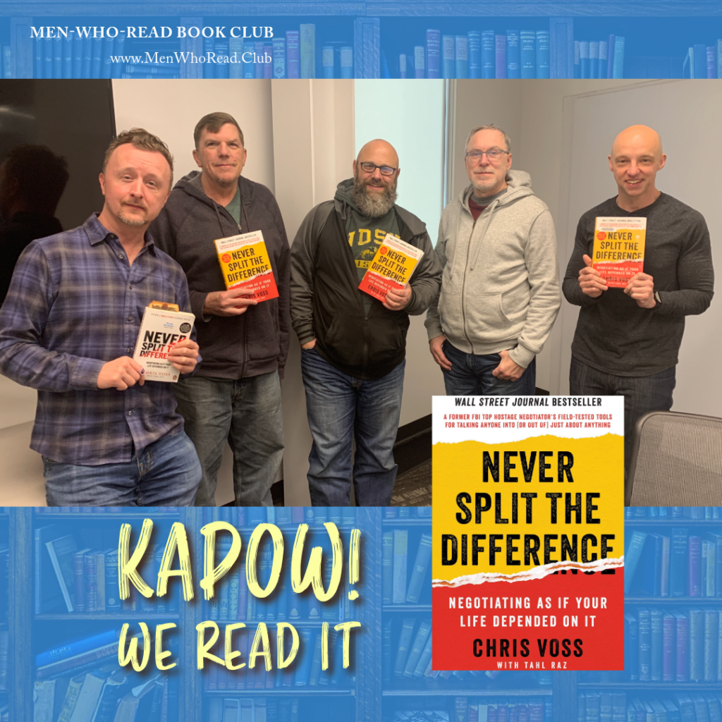 Men-Who-Read book club, group of men holding up the book "Never Split the Difference"