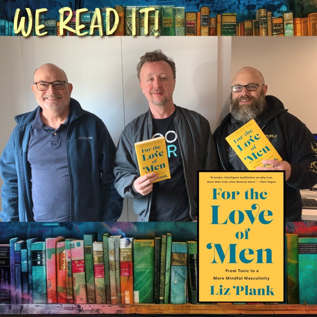 Men's book club holding up "For the Love of Men" book