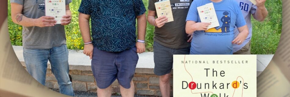 The Drunkard's Walk book, with book club members holding the paper copies of the book